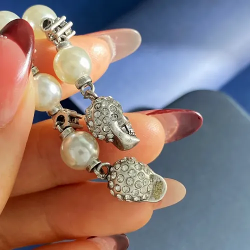 Replica Alexander McQueen Earrings For Women #1413765 $29.00 USD for Wholesale